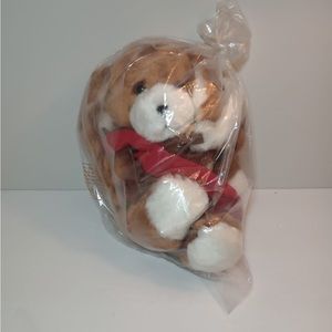 Avon Plush Puppy stuffed animal.